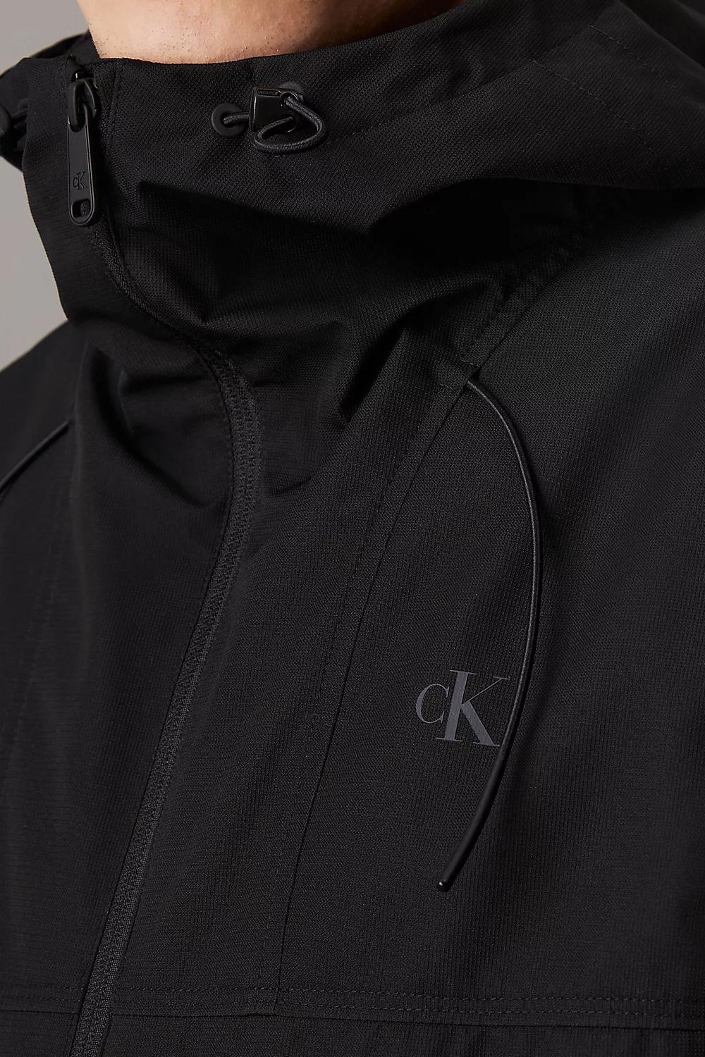 Giacca con cappuccio tecnica<BR/> J30J326715 BEH Calvin Klein