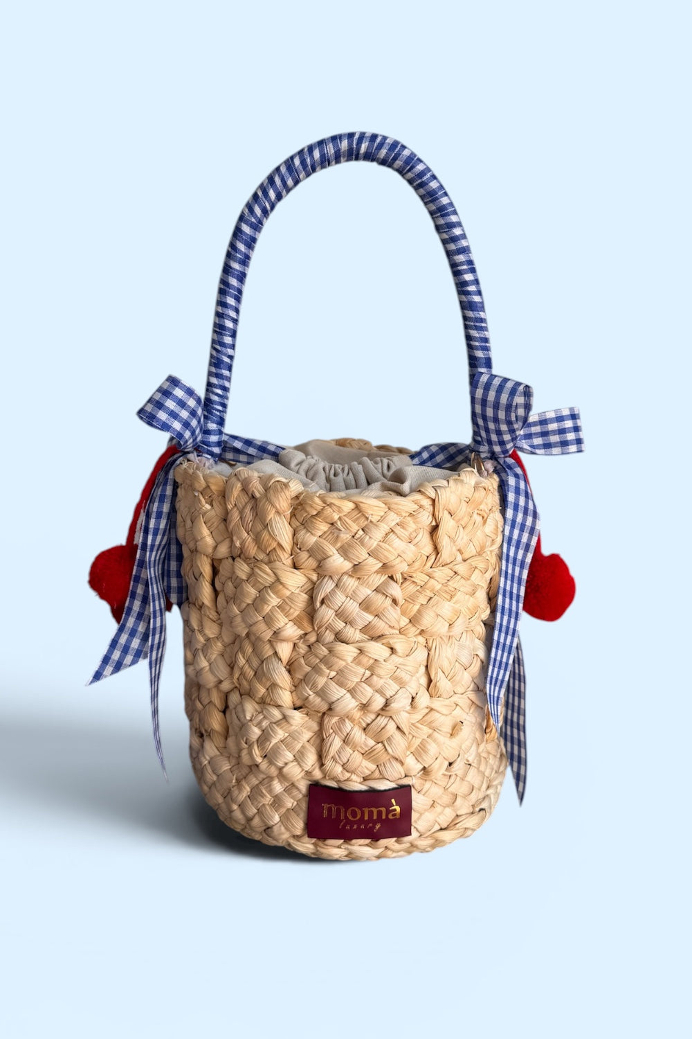 borse a secchiello in rafia intrecciata con ciliege IL CANESTRO CILIEGIA BLU Momà Luxury 