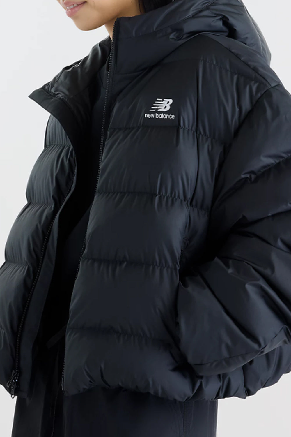 piumino corto con cappuccio WJ62V5SN BK New Balance 
