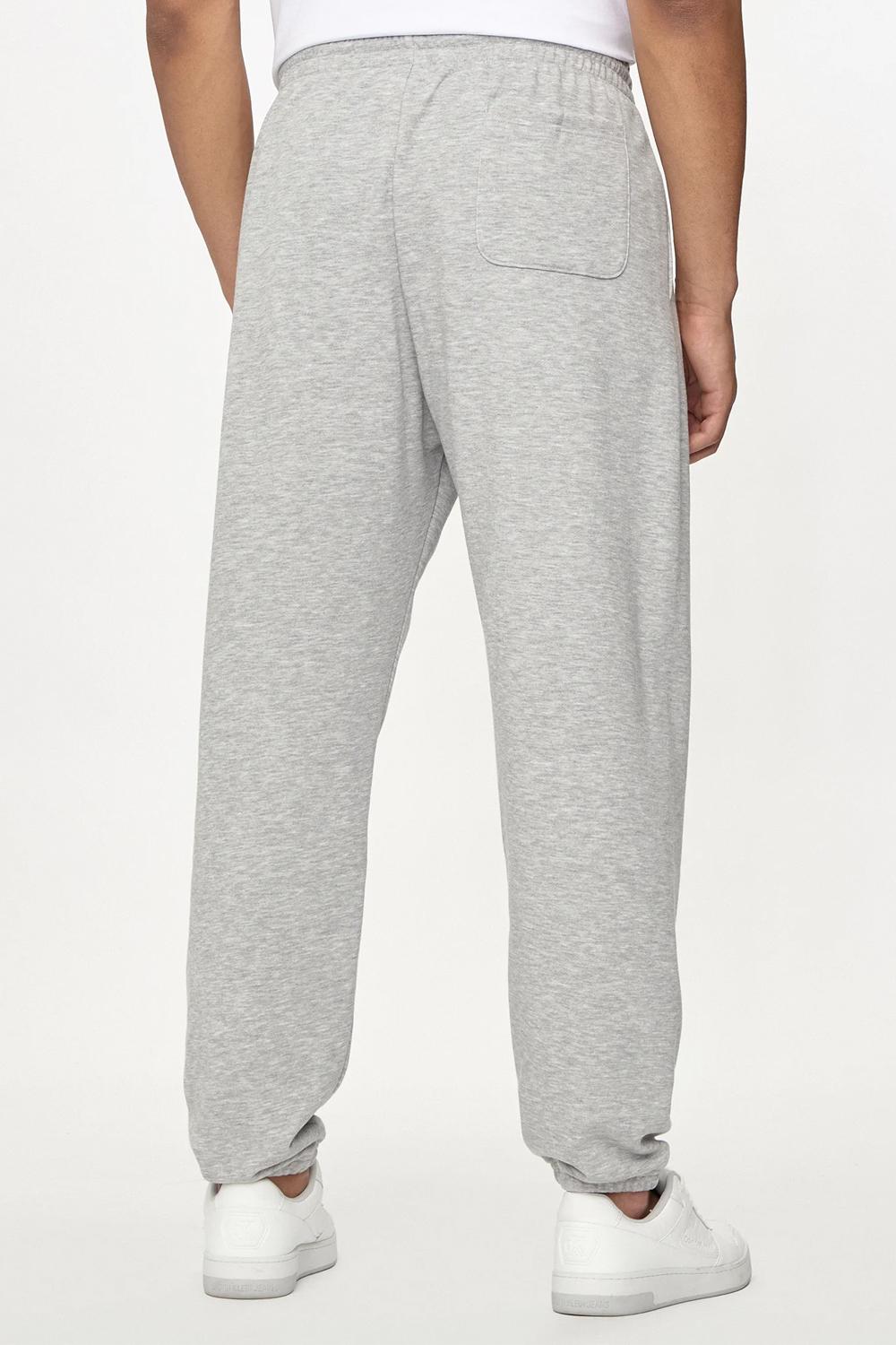 New Balance Pantaloni da tuta Essentials Relaxed Fit MP41519 AG New Balance 