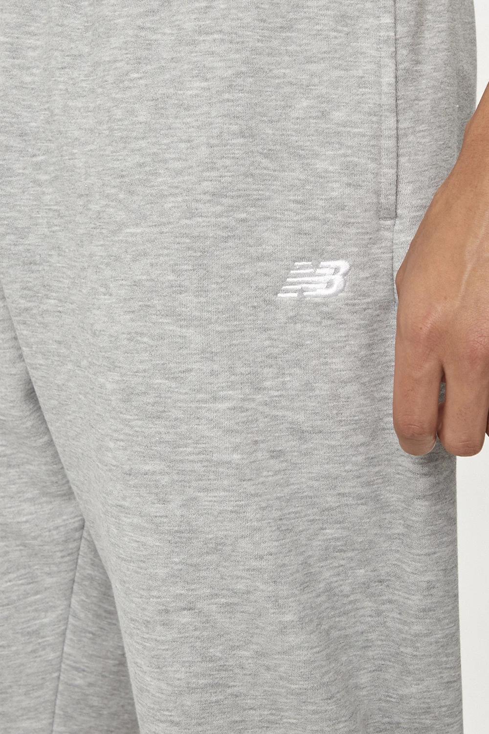 New Balance Pantaloni da tuta Essentials Relaxed Fit MP41519 AG New Balance 