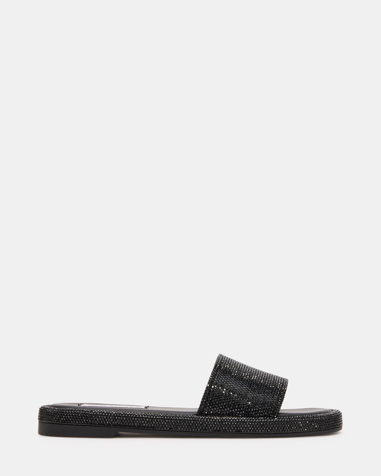 ciabatta piatta con suola in ecopelle. fascia alta sul piede. tempestata di strass in tono ACHIEVE BLACK Steve Madden 