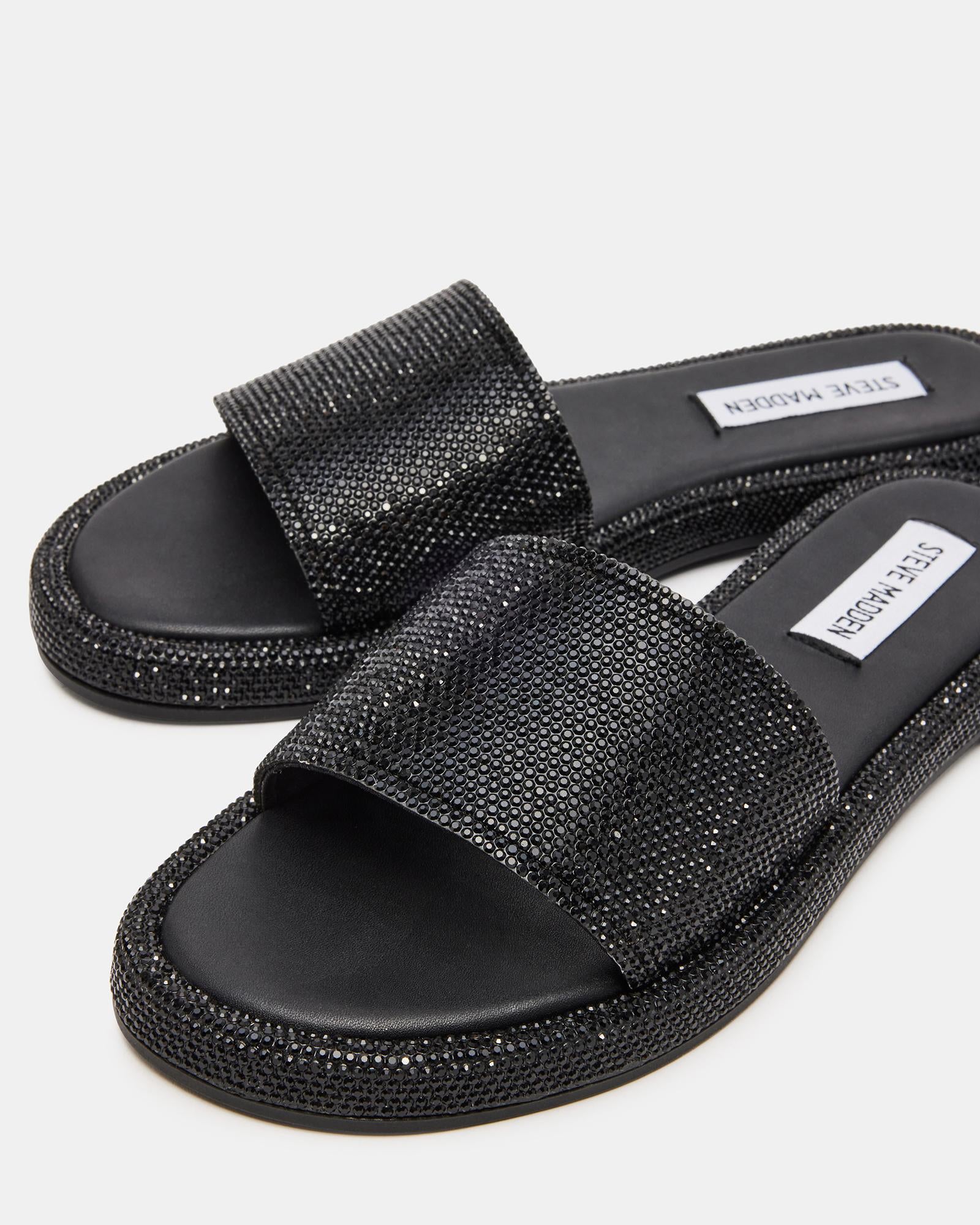 ciabatta piatta con suola in ecopelle. fascia alta sul piede. tempestata di strass in tono ACHIEVE BLACK Steve Madden 
