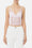 Top con trasparenze e tagli corsetto