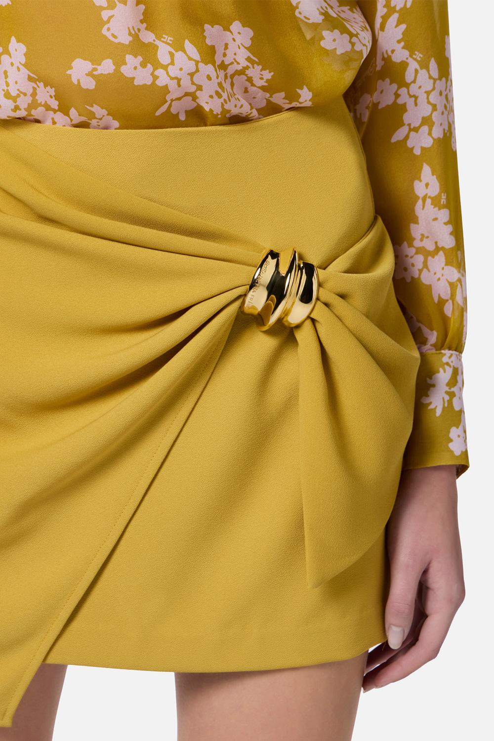 Minigonna in crêpe fluido con macro fiocco<BR/> GO073 51E2DC6 Elisabetta Franchi 