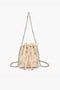 mini secchiello a tracolla in ecopelle con applicazioni in metallo e brillantini. chiusura a calamita con laccini regolabili con logo cc in metallo 151M-SS-443-TBS -CREAM La Carrie 